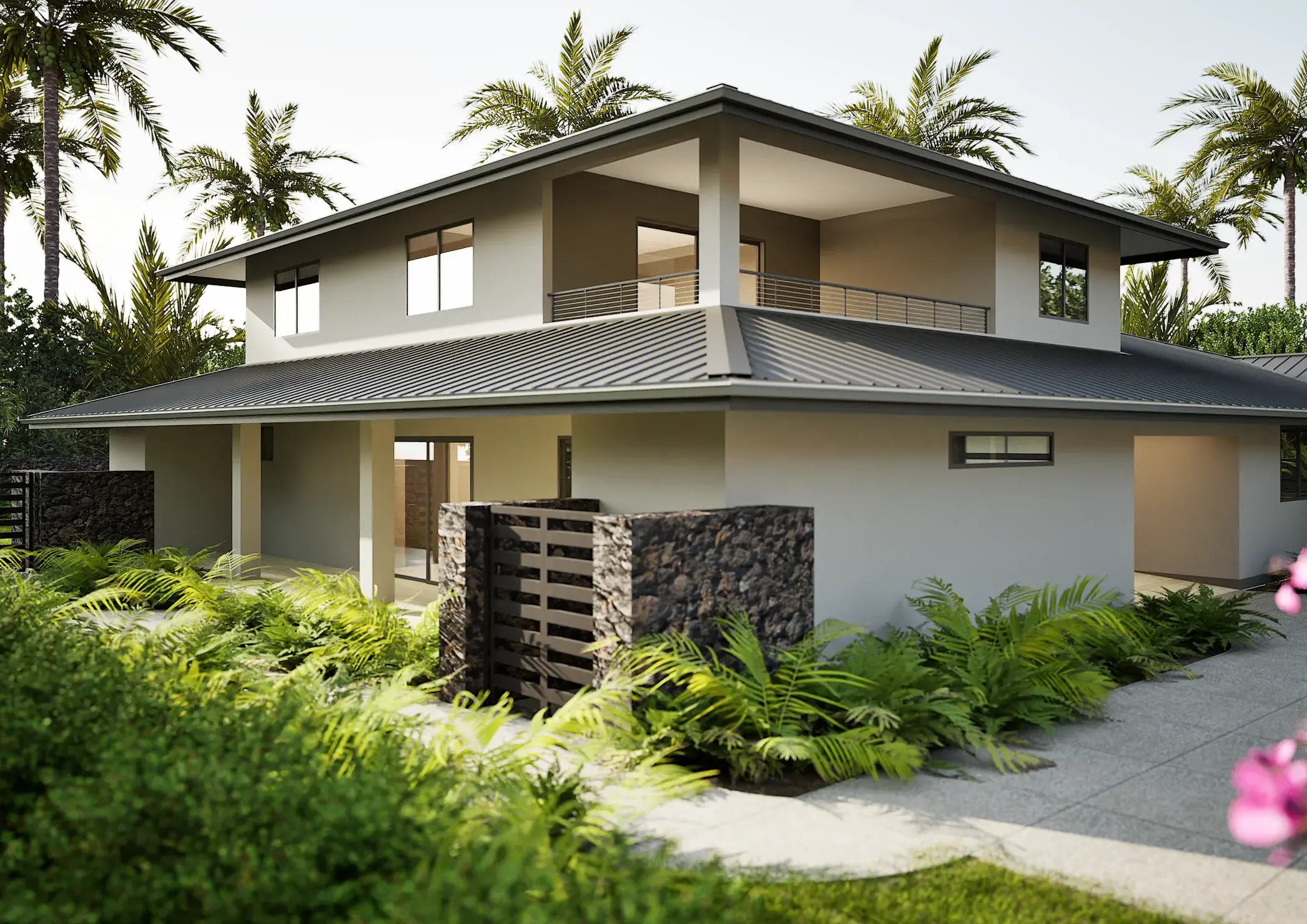 Angled view of the two-story villa with a sheltered balcony and stone privacy wall